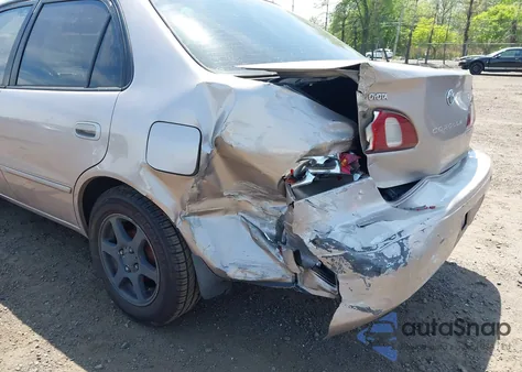 1999 Toyota Corolla Le z USA, uszkodzony, nr VIN 2T1BR12E2XC192065